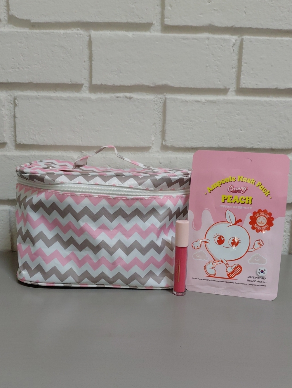Pink & Gray Chevron Cosmetic Bag with Peach Sheet Mask & Lip Gloss. NWT